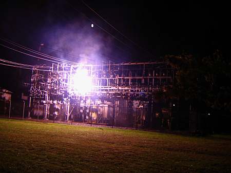 Sustained sub-station fault with a surrounding violet corona discharge in Corvallis, OR, 2005-10-30, photo courtesy Stonebridge Engineering.